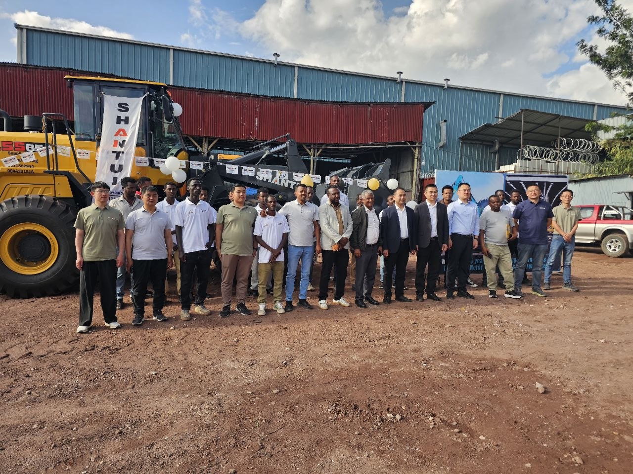 Shantui's Top Manager staff with Our team and customer